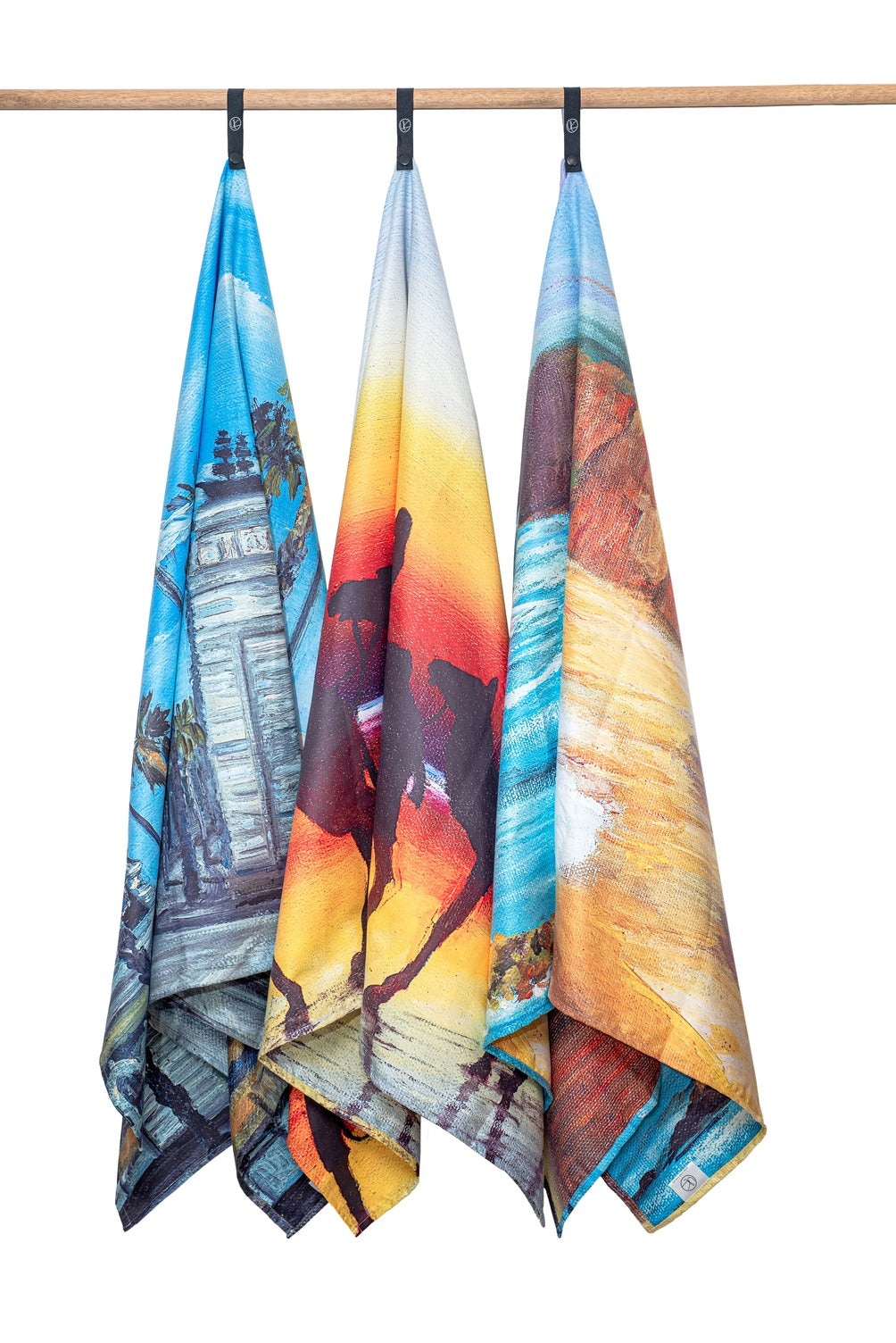 Glenelg, Broome and 12 Apostles Microfibre Artistic Towel. Large size, 170cm x 95cm, soft touch, compact and sand free beach towel. An Aussie-inspired art showcasing magnificent landmarks and the Aussie lifestyle.